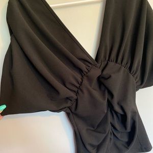 Deep plunge black top